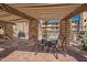 This community features a shaded patio area with outdoor dining table at 4950 N Miller Rd # 233, Scottsdale, AZ 85251