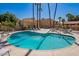 Enjoy community pool surrounded by mature palm trees at 4950 N Miller Rd # 233, Scottsdale, AZ 85251