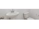 Bathroom features a sleek white sink and toilet at 5058 E Umber Rd, San Tan Valley, AZ 85143