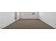 Neutral bedroom with carpeted floors, closet and two windows at 5058 E Umber Rd, San Tan Valley, AZ 85143