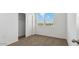 Carpeted bedroom with closet and natural light from window at 5058 E Umber Rd, San Tan Valley, AZ 85143