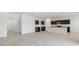 Open concept kitchen and living space with modern appliances and fixtures at 5058 E Umber Rd, San Tan Valley, AZ 85143