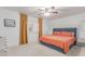 Cozy bedroom featuring a large window, stylish decor, and comfortable furnishings for a relaxing retreat at 5104 N 32Nd St # 144, Phoenix, AZ 85018