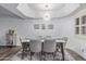 Elegant dining room showcasing a modern chandelier and stylish decor for a sophisticated dining experience at 5104 N 32Nd St # 144, Phoenix, AZ 85018