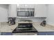 Well-equipped kitchen featuring stainless steel appliances and granite countertops, perfect for culinary enthusiasts at 5104 N 32Nd St # 144, Phoenix, AZ 85018