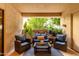 Cozy outdoor patio with cushioned seating and views of lush greenery at 5104 N 32Nd St # 144, Phoenix, AZ 85018