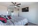 Bedroom with a large closet and entertainment TV on the wall at 5305 E Silverbell Rd, San Tan Valley, AZ 85143