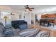 Open-concept living room seamlessly connects to the kitchen and dining area at 5305 E Silverbell Rd, San Tan Valley, AZ 85143
