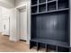Organized mudroom featuring custom cubbies, a bench, and neutral tones, offering a practical entry solution at 5440 E Calle Camelia --, Phoenix, AZ 85018