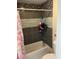 Full bathroom featuring tiled shower with tub and modern fixtures at 6711 W Osborn Rd # 138, Phoenix, AZ 85033
