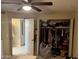 Bedroom closet with ample storage space for clothes and personal items at 6711 W Osborn Rd # 138, Phoenix, AZ 85033