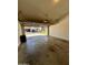 Spacious two-car garage with automatic door and view of the driveway at 6845 W Caron Dr, Peoria, AZ 85345