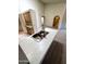 Open-concept kitchen featuring granite countertop and stainless steel sink at 6845 W Caron Dr, Peoria, AZ 85345