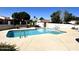 Refreshing community swimming pool with surrounding lounge area, perfect for relaxation and social gatherings at 6845 W Caron Dr, Peoria, AZ 85345