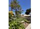 Community streetscape featuring lush landscaping, a 'no parking' sign, and mature trees at 6845 W Caron Dr, Peoria, AZ 85345