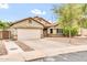 Inviting single-Gathering home with a well-maintained front yard, two-car garage and neutral color palette at 7425 N 75Th Dr, Glendale, AZ 85303