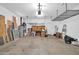 Spacious garage with ample storage shelving and room for multiple vehicles at 7425 N 75Th Dr, Glendale, AZ 85303