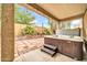 Relaxing covered patio featuring a hot tub, with easy access steps at 7425 N 75Th Dr, Glendale, AZ 85303