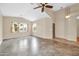 Spacious living room featuring vaulted ceilings, tile floors, and lots of natural light at 7425 N 75Th Dr, Glendale, AZ 85303
