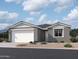 Charming single-story home with a two-car garage and neutral stucco exterior at 7594 W Avenida Del Rey --, Peoria, AZ 85383