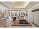 Bright, open-concept kitchen featuring an island cooktop, granite countertops, and unique design at 7728 E Mary Sharon Dr, Scottsdale, AZ 85266