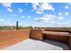 Rooftop deck with seating and expansive views of the desert landscape at 7728 E Mary Sharon Dr, Scottsdale, AZ 85266