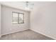 Bedroom featuring neutral paint and carpet with a ceiling fan at 8802 E University Dr # 28, Mesa, AZ 85207
