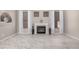 Living room featuring a fireplace, light tile flooring, and elegant decor for a comfortable atmosphere at 8802 E University Dr # 28, Mesa, AZ 85207