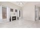 Bright living area with a fireplace, vaulted ceilings, and large windows providing plenty of natural light at 8802 E University Dr # 28, Mesa, AZ 85207
