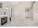 Spacious living room with fireplace, tile flooring, and high ceilings offering an open and inviting space at 8802 E University Dr # 28, Mesa, AZ 85207
