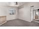 Upstairs living room featuring neutral paint and carpet with access to the bathroom at 8802 E University Dr # 28, Mesa, AZ 85207
