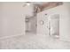 Large living room featuring tile flooring, staircase, a cozy fireplace, and access to other rooms at 8802 E University Dr # 28, Mesa, AZ 85207