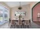 Tastefully staged dining room with modern decor and natural light at 9135 W Hazelwood St, Phoenix, AZ 85037