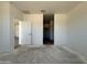 Versatile room with neutral walls, offering a blank canvas for your design ideas and customization at 9532 W Parkway Dr, Tolleson, AZ 85353