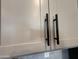 Close up of gray cabinets with black, contemporary hardware at 9544 W Parkway Dr, Tolleson, AZ 85353