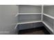 A kitchen pantry with multiple shelves for ample storage and organization at 9544 W Parkway Dr, Tolleson, AZ 85353