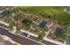 An aerial view showcases a community park, basketball court, pickle ball, and lush landscaping at 9963 W Verde Ln, Avondale, AZ 85392