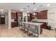 Beautiful kitchen featuring granite countertops, a large island, and stainless steel appliances at 10221 E Wavelength Ave, Mesa, AZ 85212