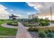 Picturesque community park with walking paths, playground equipment, and shaded seating at 10221 E Wavelength Ave, Mesa, AZ 85212