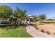 Scenic park walkway leads to a covered picnic area for community enjoyment at 10221 E Wavelength Ave, Mesa, AZ 85212
