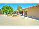 Community building with desert landscaping and tiled roof, offering a welcoming exterior at 111 S Greenfield Rd # 244, Mesa, AZ 85206