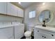 Modern laundry room with washer, dryer, and sink, offering convenience and style at 111 S Greenfield Rd # 244, Mesa, AZ 85206