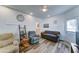 Inviting living room with vinyl flooring, ample seating, and plenty of natural light at 111 S Greenfield Rd # 244, Mesa, AZ 85206