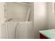 Accessible bathroom with a step-in tub, handheld shower, and tile flooring at 126 N 58Th St, Mesa, AZ 85205
