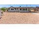 Charming single-story home with desert landscaping and covered parking at 126 N 58Th St, Mesa, AZ 85205