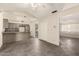 Open floor plan featuring a modern kitchen and stylish flooring at 126 N 58Th St, Mesa, AZ 85205