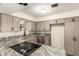 Beautiful kitchen featuring granite countertops, updated appliances, and sleek wood cabinets at 126 N 58Th St, Mesa, AZ 85205