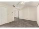 The open-plan living area features modern gray tile flooring, bright walls, and natural light at 126 N 58Th St, Mesa, AZ 85205