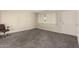 Bright room featuring stylish flooring, a window, and closet space at 126 N 58Th St, Mesa, AZ 85205