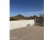 Backyard features a block wall, mountain views, and desert landscaping at 12955 E Sahuaro Dr, Scottsdale, AZ 85259